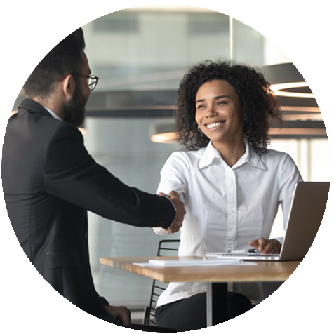 Woman shaking hands with man